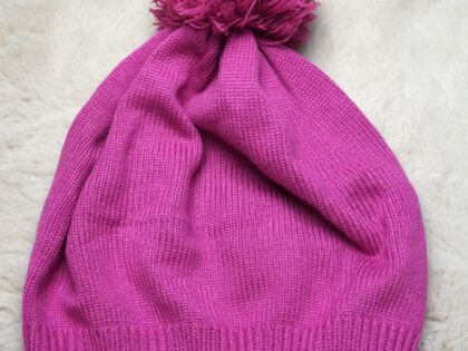 Roze muts met Pompon